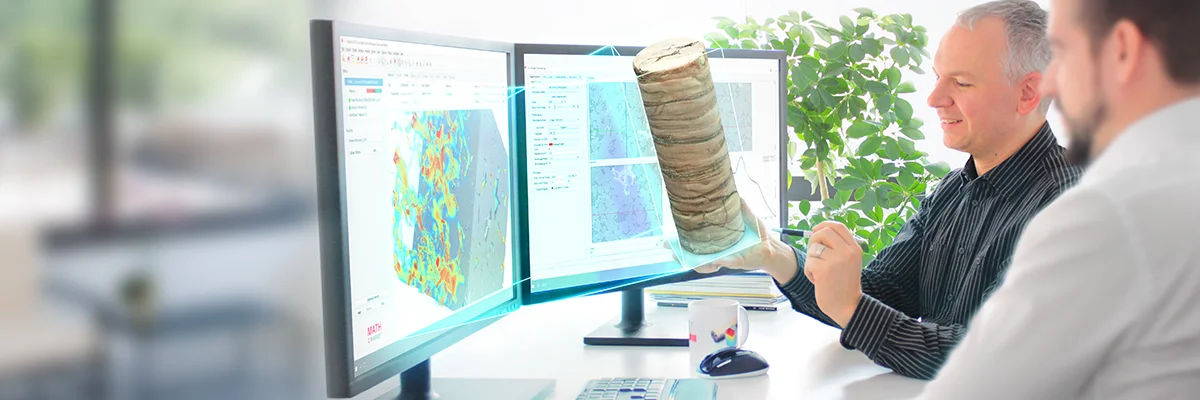 Math2Market support in a customer consultation: An employee explains the GeoDict analysis of a digital twin of a real drill core sample